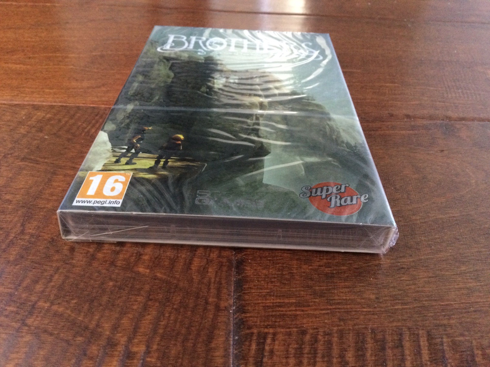 Brothers: A Tale of Two Sons Nintendo Switch Super Rare Games Holo Slip New