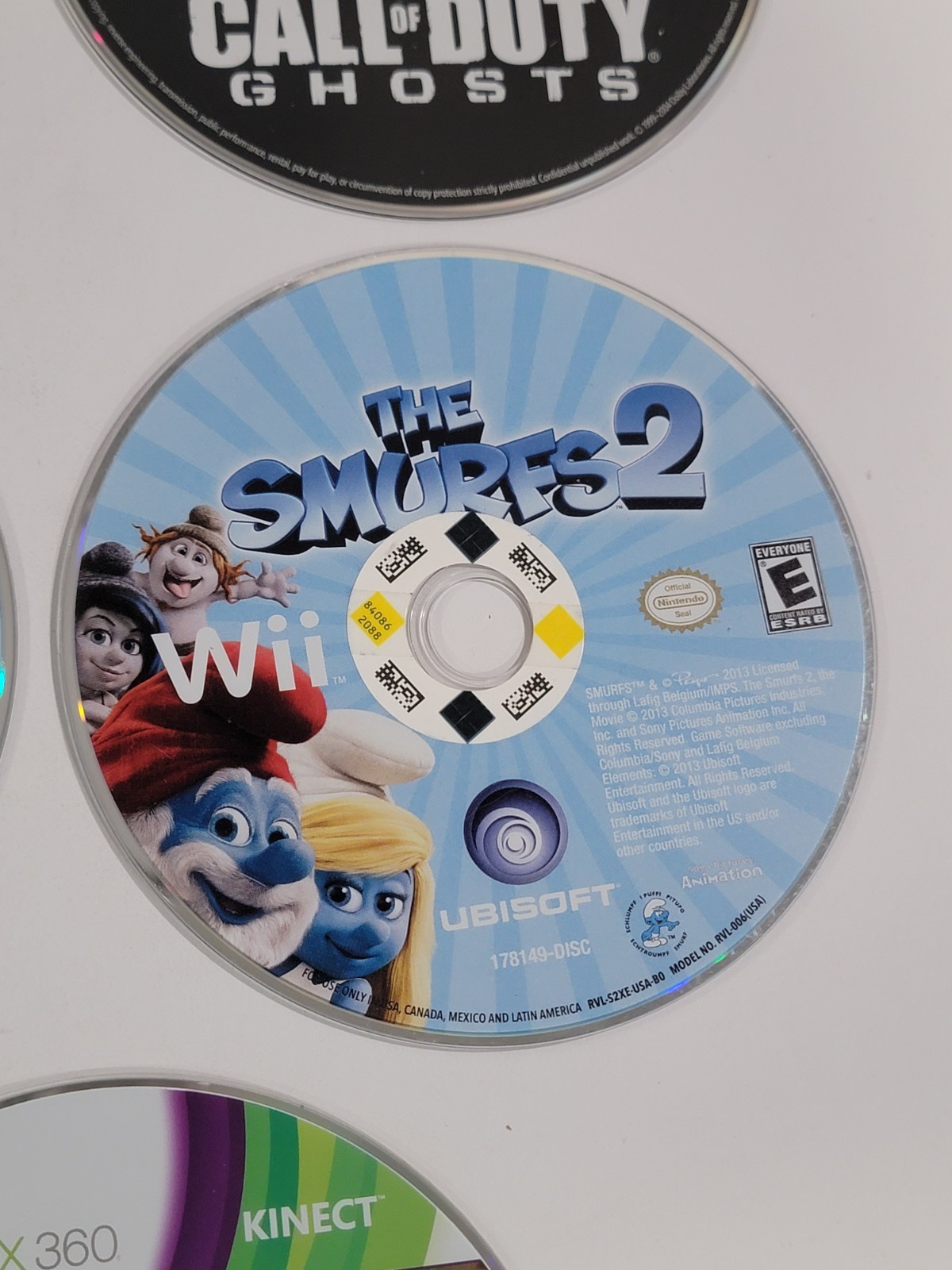 10 Loose Disc Video Game Lot – PS3, Xbox 360, Xbox One, & Wii – Smurfs, COD
