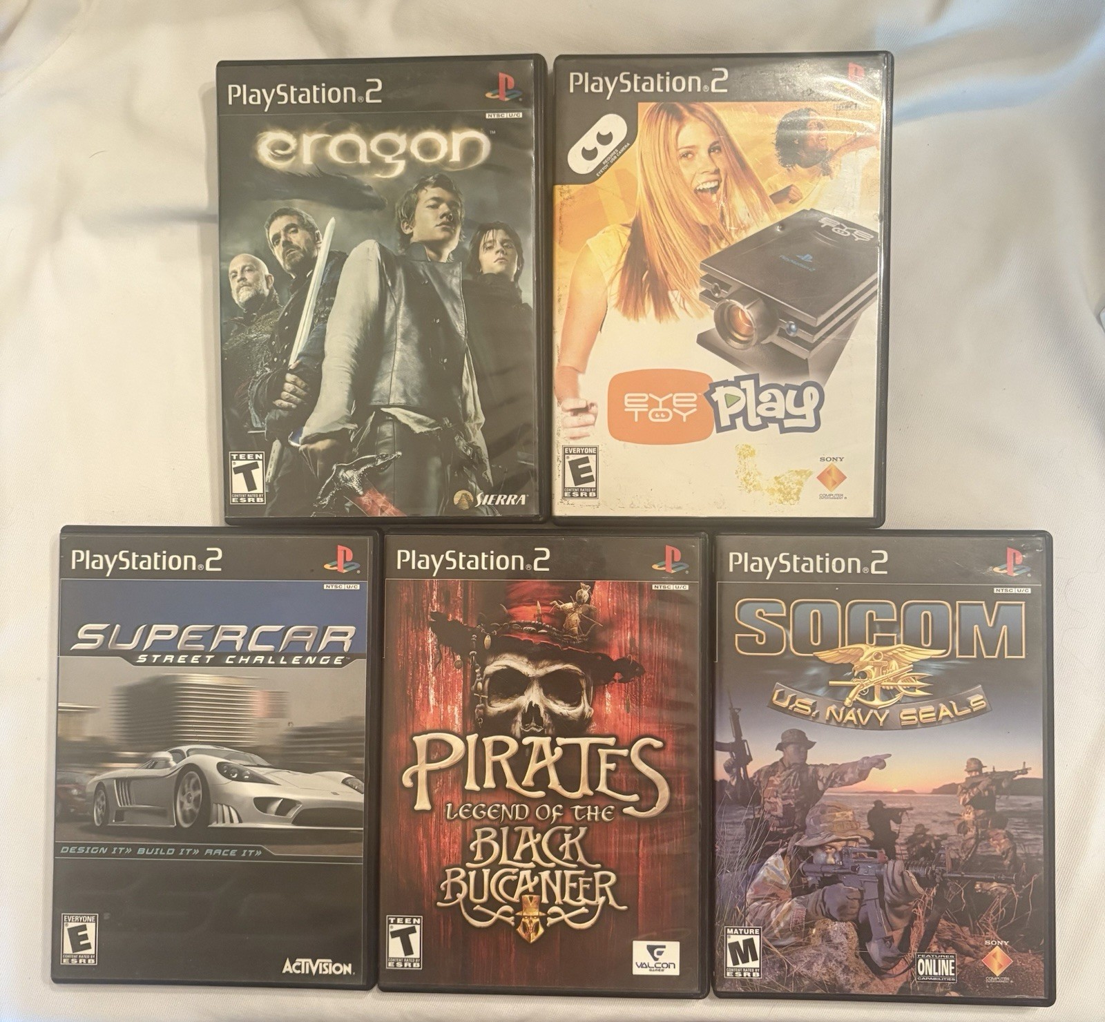 PS2 Game Collection (Pirates, Eragon, Eye Toy, SOCOM, Supercar)