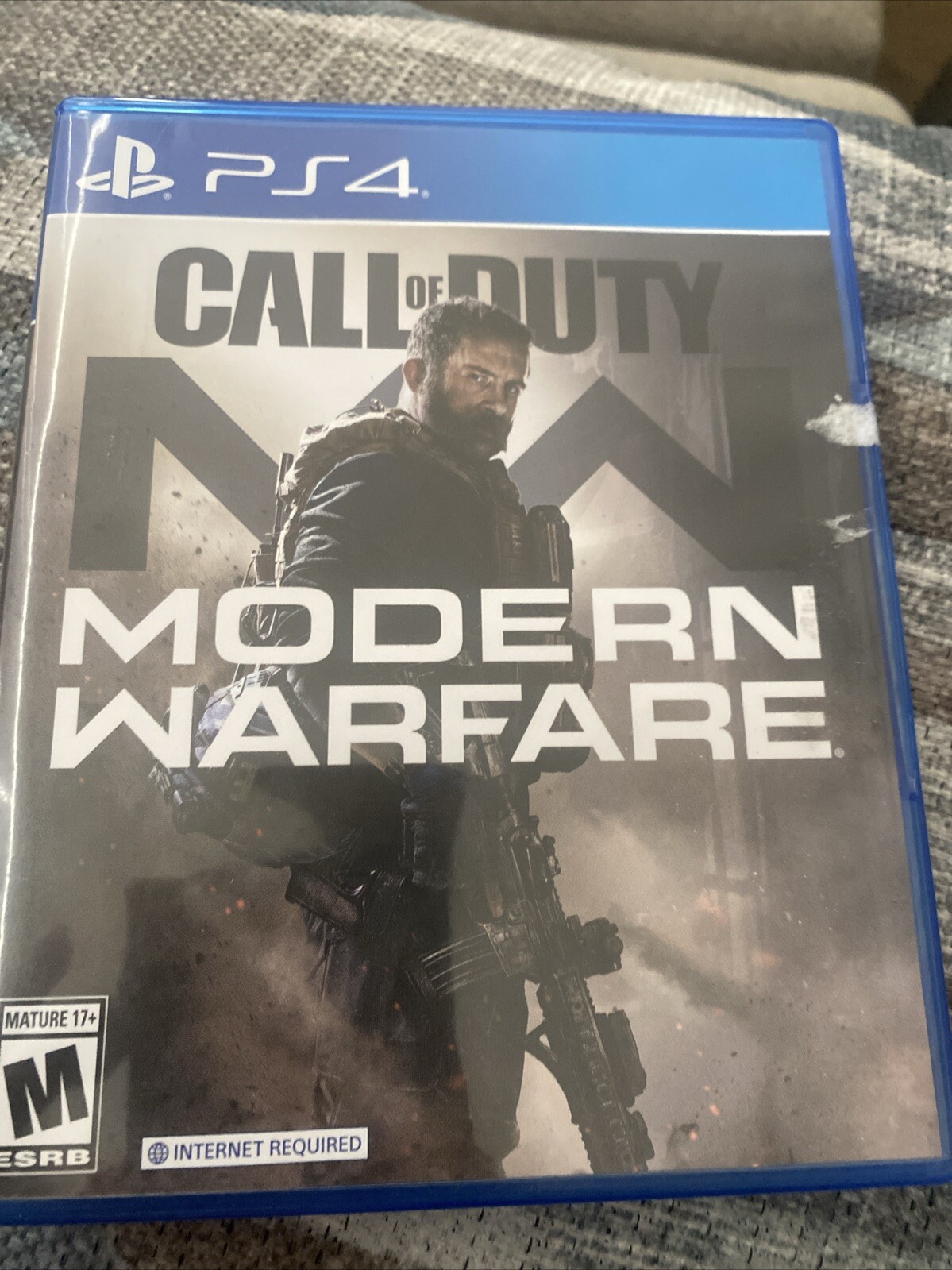 Call of Duty: Modern Warfare – Sony PlayStation 4 with labels’ residue